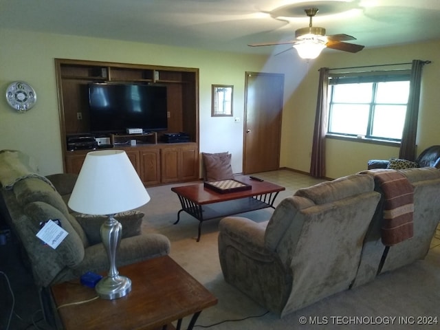 living room with ceiling fan and light carpet