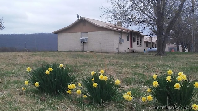 view of property exterior featuring cooling unit