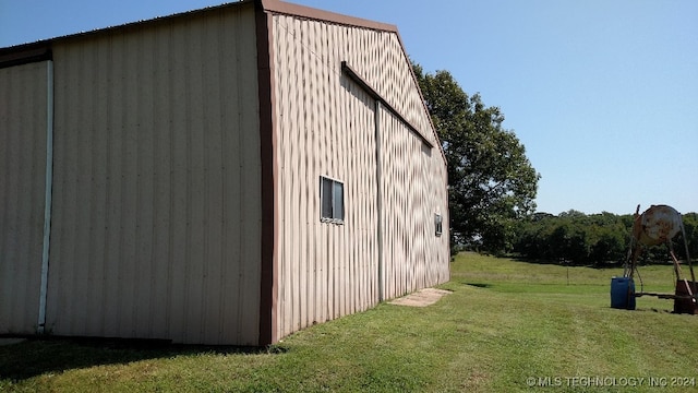 view of property exterior featuring a yard