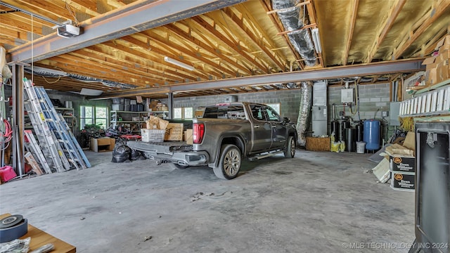 garage featuring a garage door opener