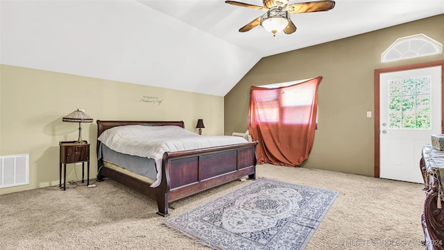 bedroom featuring vaulted ceiling, ceiling fan, and light colored carpet