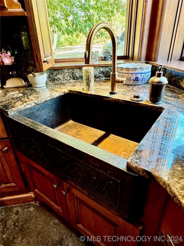 interior space featuring sink and a healthy amount of sunlight