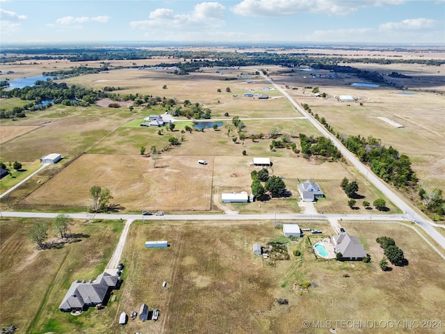 bird's eye view featuring a water view and a rural view