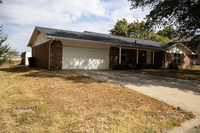 ranch-style home featuring a garage