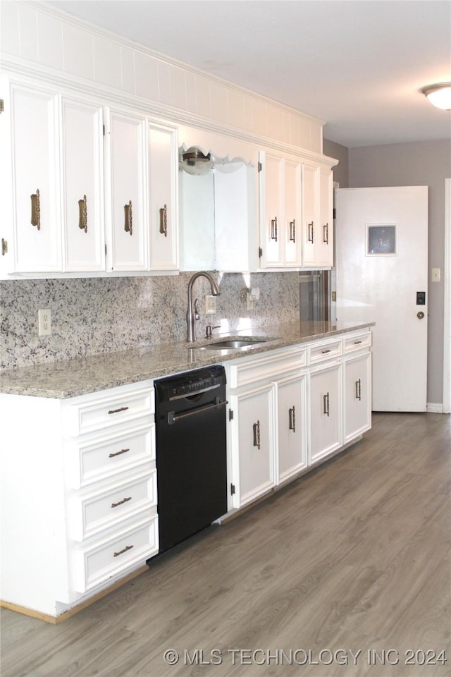 kitchen with white cabinetry, dishwasher, sink, backsplash, and light stone counters