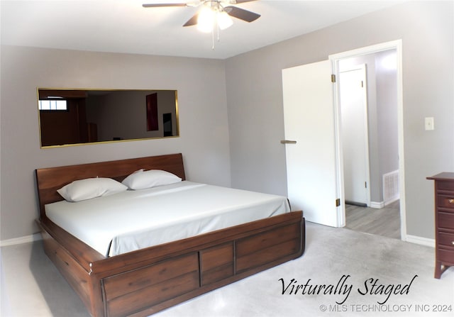 bedroom featuring light carpet and ceiling fan