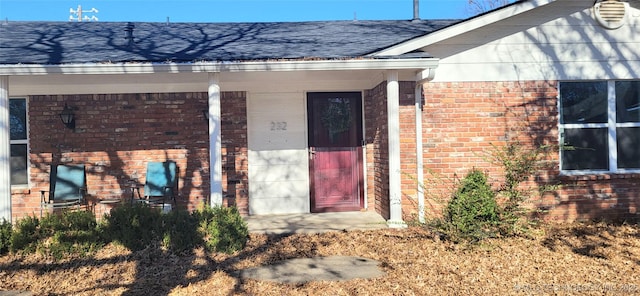 entrance to property with a porch