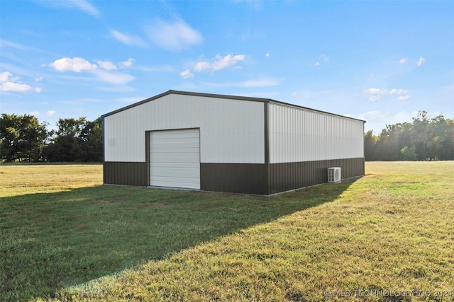 garage featuring a lawn