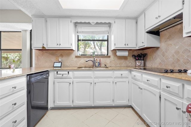 kitchen with a healthy amount of sunlight, sink, white cabinets, and black appliances