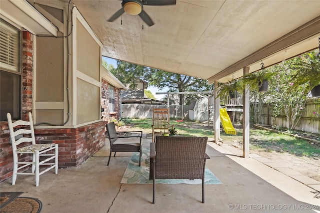 view of patio / terrace featuring ceiling fan