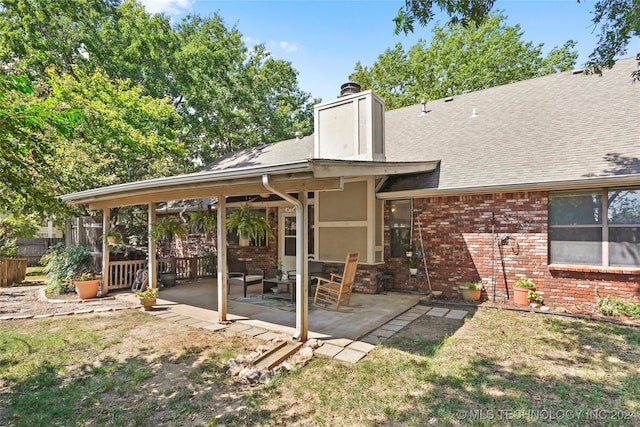 rear view of house with a patio area