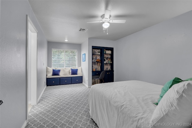 carpeted bedroom with ceiling fan