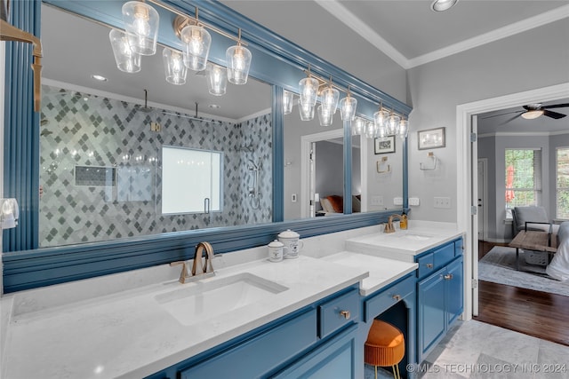 bathroom with vanity, walk in shower, wood-type flooring, crown molding, and ceiling fan