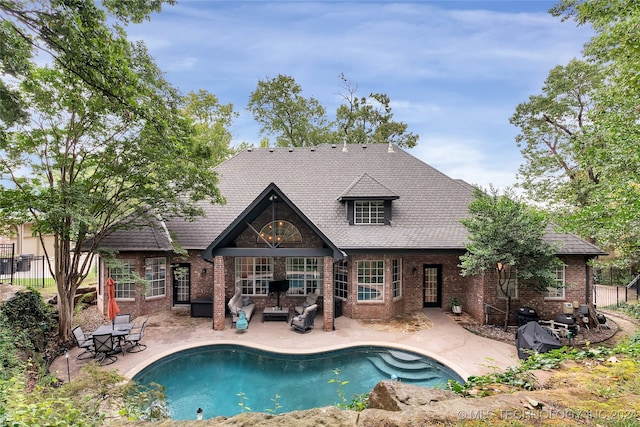 view of pool featuring a patio