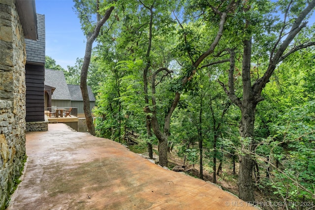 view of patio with a wooden deck