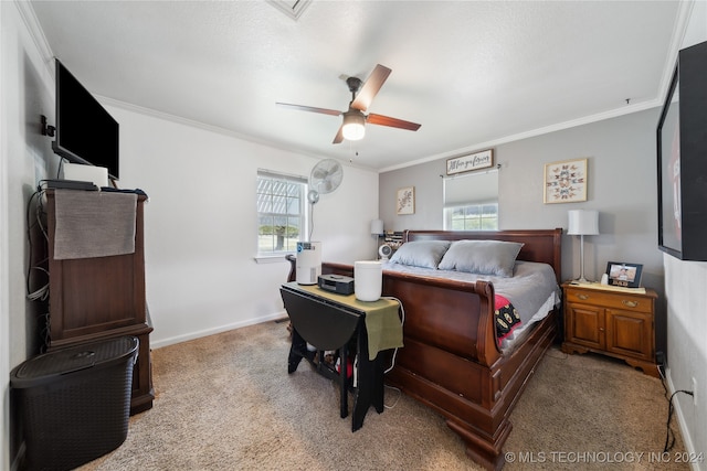 bedroom featuring ornamental molding, light colored carpet, and ceiling fan