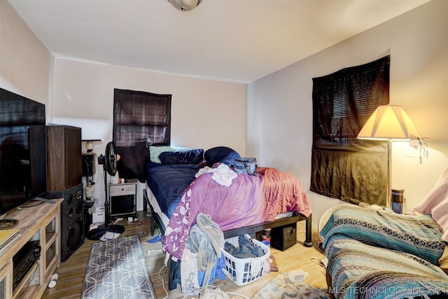 bedroom featuring wood-type flooring