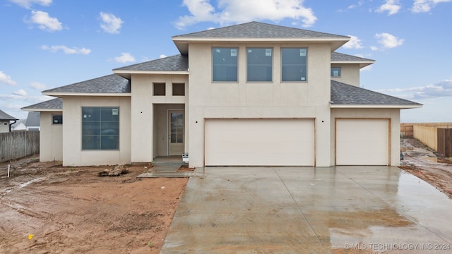 view of front of property with a garage