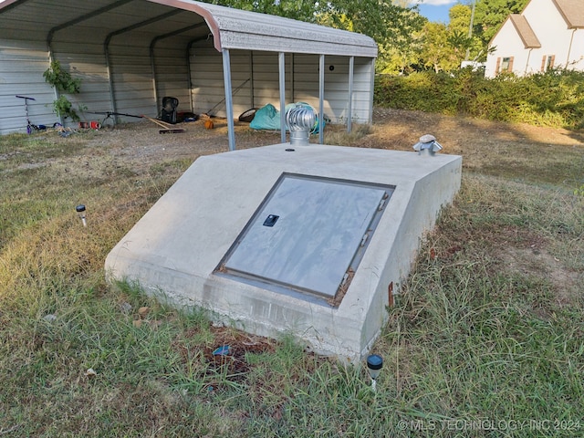 view of entry to storm shelter