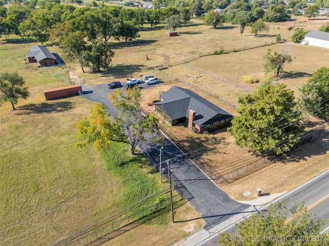 birds eye view of property featuring a rural view