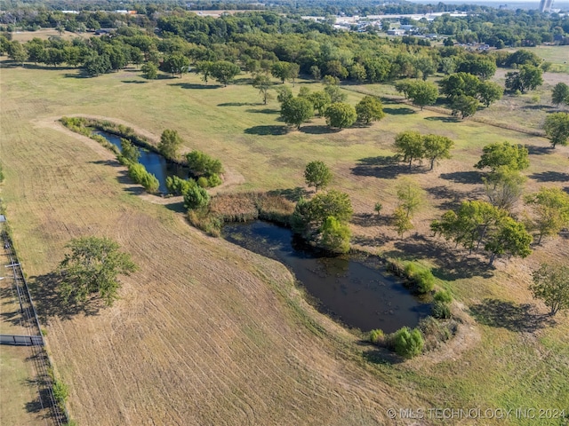 bird's eye view featuring a water view and a rural view