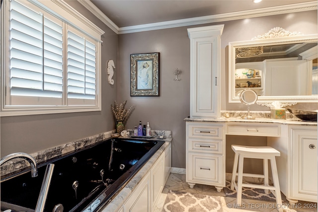 bathroom featuring vanity, tile patterned flooring, a bathtub, and crown molding