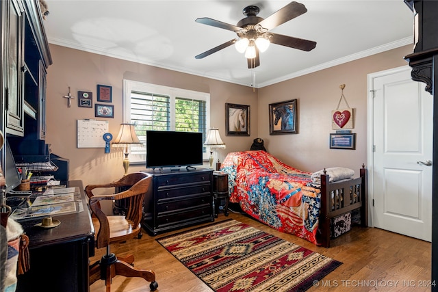 bedroom with ceiling fan, ornamental molding, and hardwood / wood-style floors