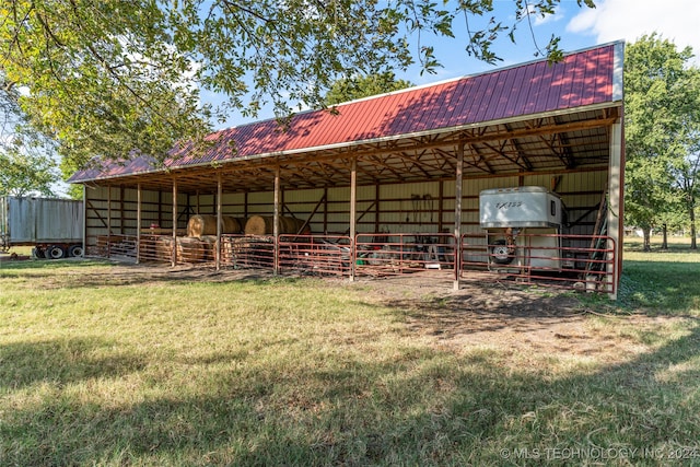 back of house with an outdoor structure