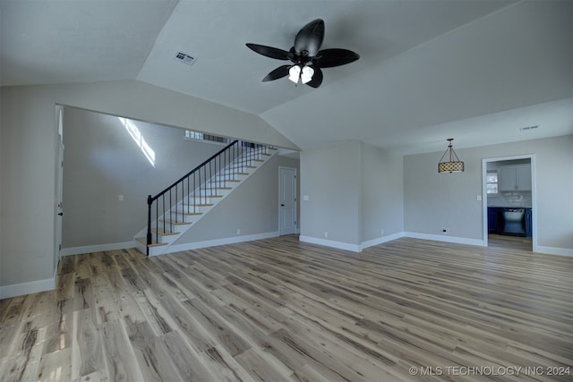 unfurnished living room with light wood-type flooring, lofted ceiling, and ceiling fan