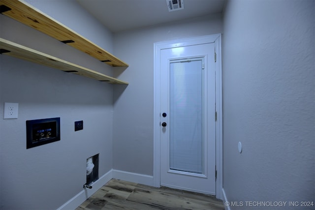 laundry area with hookup for a washing machine, light wood-type flooring, and hookup for an electric dryer