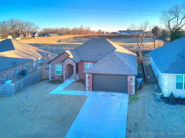 view of front of home with a garage