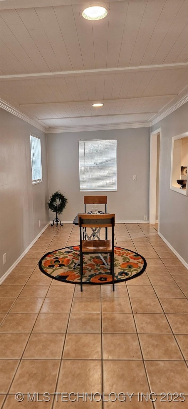 tiled dining area with crown molding