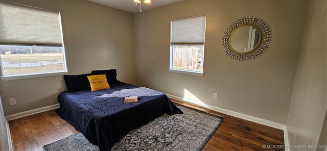 bedroom featuring dark hardwood / wood-style floors