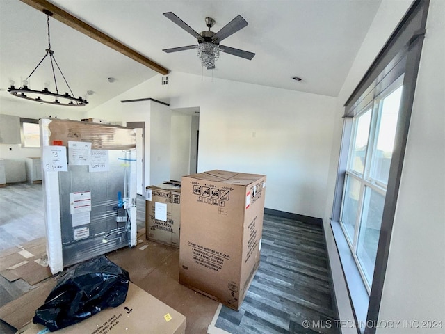 interior space with ceiling fan, dark hardwood / wood-style flooring, and lofted ceiling with beams