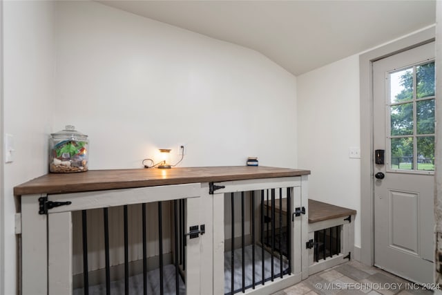 interior space featuring lofted ceiling