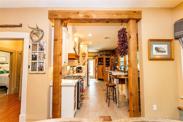 hallway featuring light hardwood / wood-style flooring