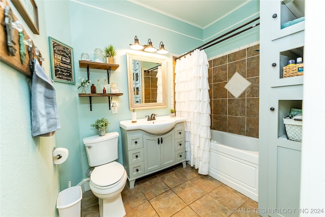 full bathroom featuring tile patterned floors, crown molding, shower / bath combo with shower curtain, vanity, and toilet