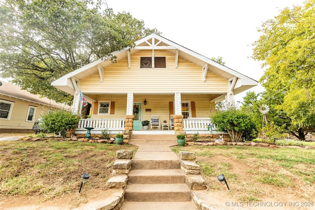 bungalow-style home with a porch