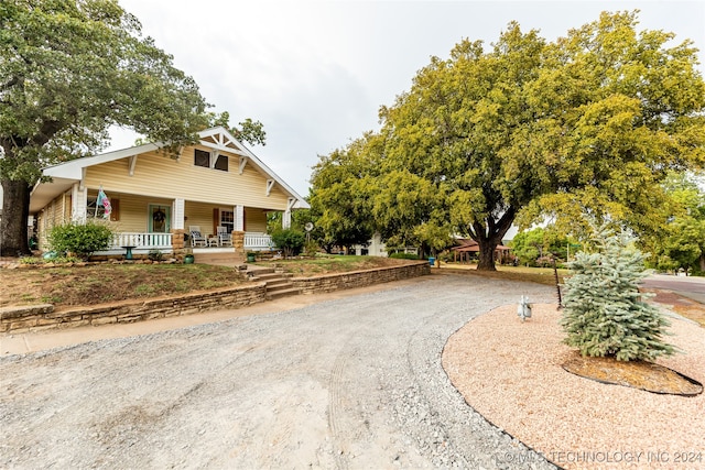 exterior space featuring covered porch