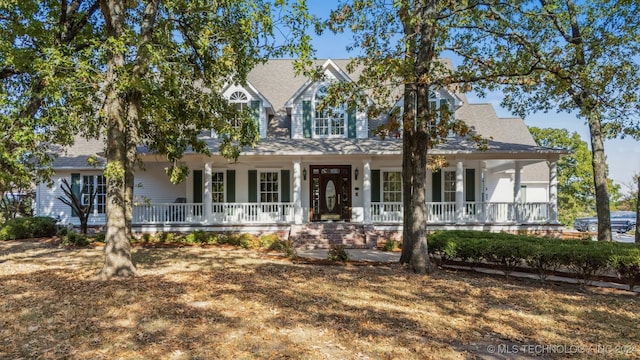 view of front of home featuring covered porch