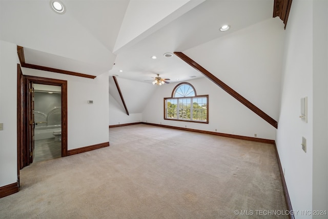 bonus room featuring vaulted ceiling, ceiling fan, and light colored carpet