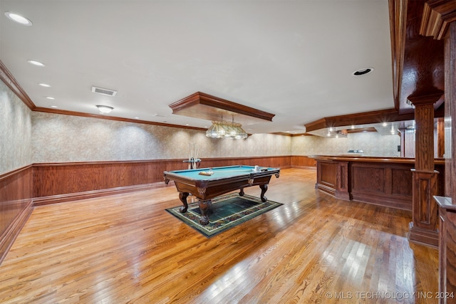 playroom featuring ornamental molding, light wood-type flooring, pool table, and ornate columns