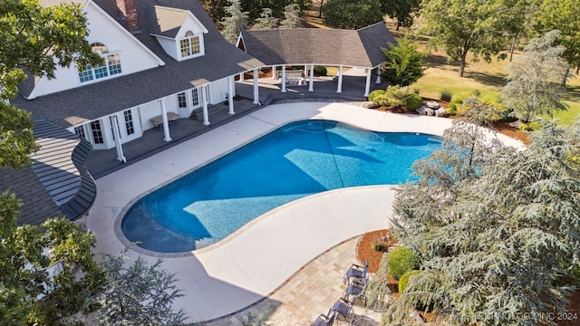 view of pool featuring a patio area