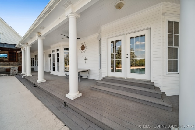 wooden deck featuring french doors