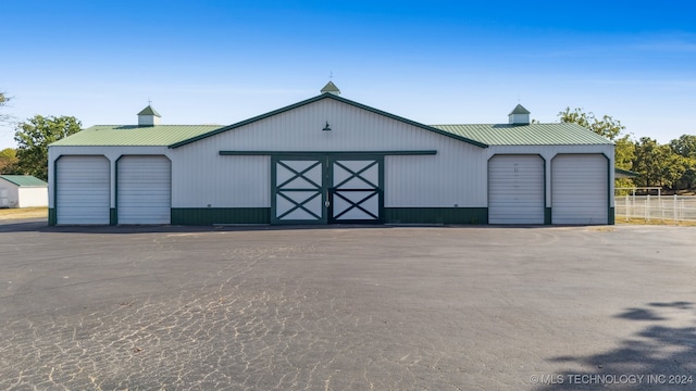 garage with wood walls