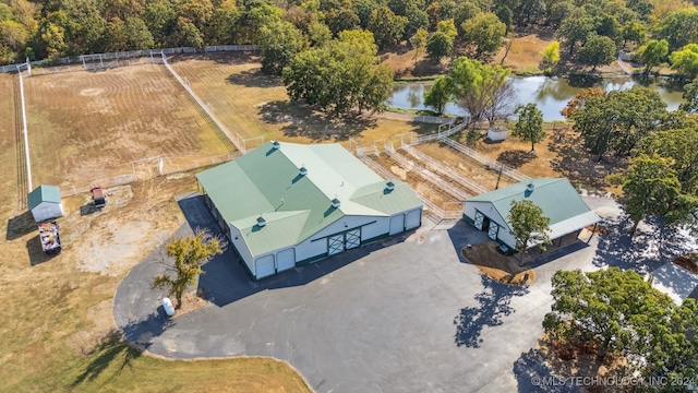 aerial view featuring a rural view and a water view