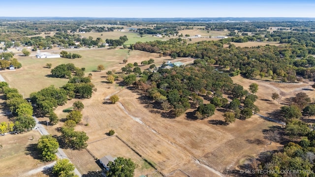 birds eye view of property featuring a rural view