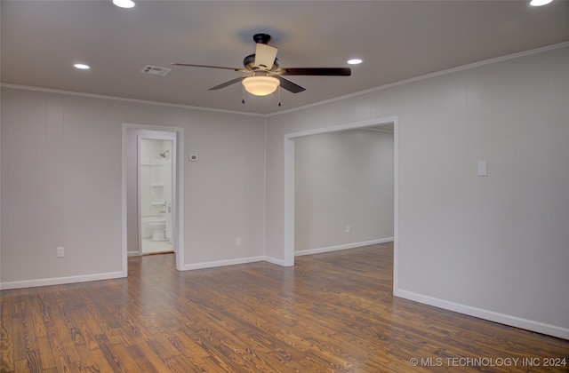 unfurnished room with ceiling fan, ornamental molding, and dark wood-type flooring