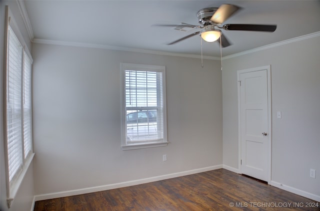 unfurnished room featuring ceiling fan, dark hardwood / wood-style flooring, and ornamental molding