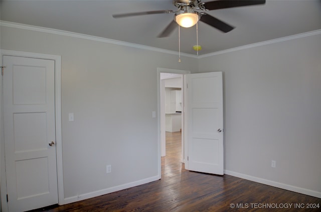 unfurnished bedroom with dark wood-type flooring, ceiling fan, and ornamental molding